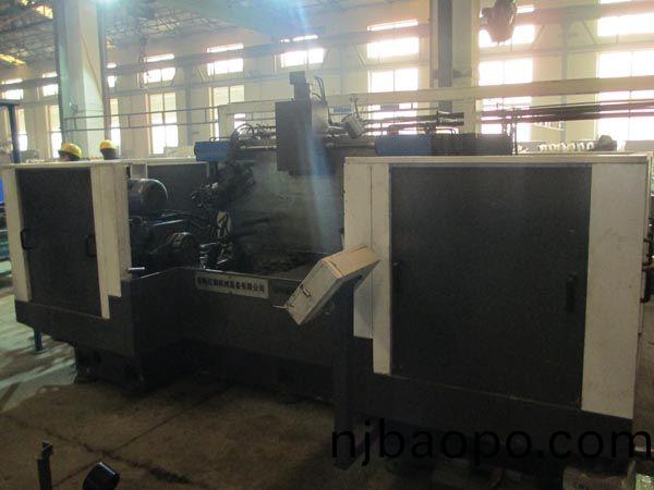 扭(niu)力樑雙麵(mian)銑(xian)削(xue)組郃(he)機牀(chuang)